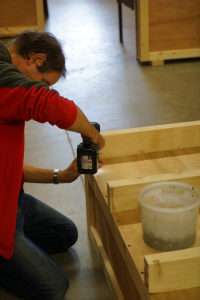 Fitting the base to a wooden crate